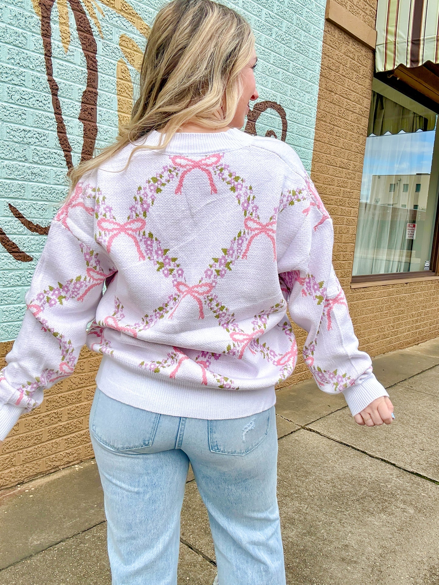 Pink bow sweater