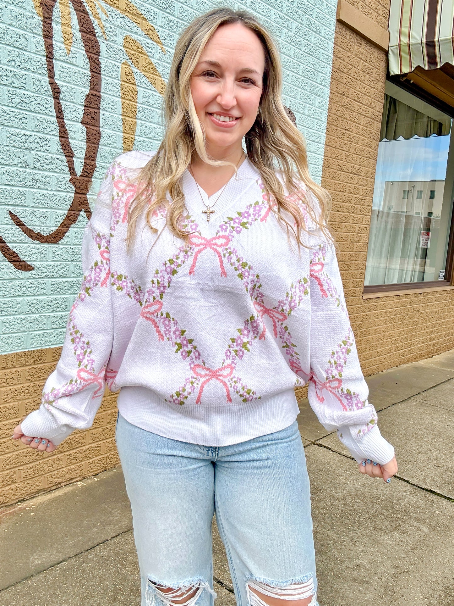 Pink bow sweater
